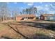 Large backyard with mature trees and a spacious lawn at 44339 Us 52 N Hwy, Richfield, NC 28137