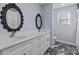 Modern bathroom with double vanity and marble-look tile at 44339 Us 52 N Hwy, Richfield, NC 28137