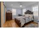 Spacious bedroom with barn door and hardwood floors at 44339 Us 52 N Hwy, Richfield, NC 28137
