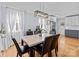 Spacious dining room with marble table, modern chandelier, and kitchen view at 44339 Us 52 N Hwy, Richfield, NC 28137