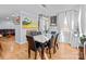 Elegant dining room with hardwood floors, marble table, and modern chandelier at 44339 Us 52 N Hwy, Richfield, NC 28137