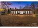 Brick ranch house with green shutters, front steps, and a spacious lawn at 44339 Us 52 N Hwy, Richfield, NC 28137