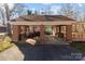 Brick garage with covered area and storage at 44339 Us 52 N Hwy, Richfield, NC 28137