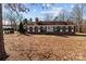 Brick ranch house with green shutters and large yard at 44339 Us 52 N Hwy, Richfield, NC 28137