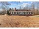 Brick ranch house with green shutters and large yard at 44339 Us 52 N Hwy, Richfield, NC 28137