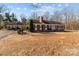 Brick ranch house with green shutters and large yard at 44339 Us 52 N Hwy, Richfield, NC 28137