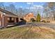 Brick ranch house with green shutters and large yard at 44339 Us 52 N Hwy, Richfield, NC 28137