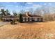Brick ranch house with green shutters and large yard at 44339 Us 52 N Hwy, Richfield, NC 28137