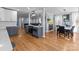 Open concept kitchen with island, stainless steel appliances, and hardwood floors at 44339 Us 52 N Hwy, Richfield, NC 28137