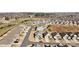 Aerial view of community with houses and streets at 5007 Grand Champion Ct, Iron Station, NC 28080
