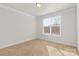 Spacious bedroom with neutral walls and carpeted floor at 5007 Grand Champion Ct, Iron Station, NC 28080