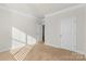 Well lit bedroom with neutral walls and carpeted floor at 5007 Grand Champion Ct, Iron Station, NC 28080