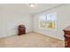 Bedroom with a window, nightstand, and ample space at 5007 Grand Champion Ct, Iron Station, NC 28080