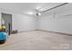 Spacious garage with overhead door and ample storage space at 5007 Grand Champion Ct, Iron Station, NC 28080