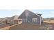 Gray house exterior with covered patio and landscaping at 5007 Grand Champion Ct, Iron Station, NC 28080