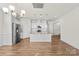 Open kitchen island with breakfast bar and stainless steel appliances at 5007 Grand Champion Ct, Iron Station, NC 28080