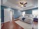 Spacious bedroom with hardwood floors and blue walls at 6922 Concord Hwy, Monroe, NC 28110