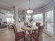 Breakfast nook with a round table and four wicker chairs at 6922 Concord Hwy, Monroe, NC 28110