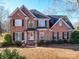 Two-story brick home with a covered entryway at 6922 Concord Hwy, Monroe, NC 28110
