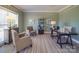 Spacious home office with hardwood floors and two armchairs at 6922 Concord Hwy, Monroe, NC 28110