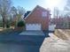 Brick house with attached garage and driveway at 6922 Concord Hwy, Monroe, NC 28110