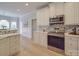 Modern kitchen with stainless steel appliances and white cabinetry at 6922 Concord Hwy, Monroe, NC 28110