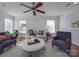 Spacious living room with comfy seating and a large window at 6922 Concord Hwy, Monroe, NC 28110