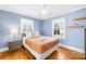 Comfortable bedroom with hardwood floors and ample light at 716 Ideal Way, Charlotte, NC 28203