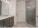 Primary bathroom with walk-in shower and double vanity at 804 Pierce Ave, Mount Holly, NC 28120