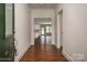 Bright entry hall with hardwood floors leading to the living area at 804 Pierce Ave, Mount Holly, NC 28120