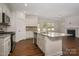 Modern kitchen featuring granite countertops and stainless steel appliances at 804 Pierce Ave, Mount Holly, NC 28120