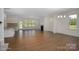 Open concept living area with kitchen, dining, and fireplace at 804 Pierce Ave, Mount Holly, NC 28120