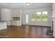 Spacious living room with hardwood floors and fireplace at 804 Pierce Ave, Mount Holly, NC 28120