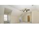 Spacious bedroom with vaulted ceiling, carpet, and window at 8147 Camelot Dr, Harrisburg, NC 28075