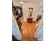 Bright hallway with hardwood floors and built-in shelving at 931 Skyline Dr, Chester, SC 29706