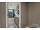Bathroom with a hexagonal tile floor and teal shower at 1033 12Th Avenue Nw Dr, Hickory, NC 28601