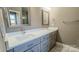 Bathroom with double sinks and a walk-in shower at 1033 12Th Avenue Nw Dr, Hickory, NC 28601