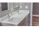 Double vanity with quartz countertop and chrome fixtures at 1033 12Th Avenue Nw Dr, Hickory, NC 28601