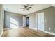 Spacious bedroom with ceiling fan and neutral decor at 1033 12Th Avenue Nw Dr, Hickory, NC 28601