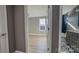 View into bedroom with light flooring and large window at 1033 12Th Avenue Nw Dr, Hickory, NC 28601
