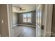 Bright bedroom with neutral walls and wood-look flooring at 1033 12Th Avenue Nw Dr, Hickory, NC 28601