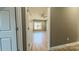 Spacious bedroom with wood flooring and a ceiling fan at 1033 12Th Avenue Nw Dr, Hickory, NC 28601