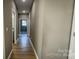 Bright hallway with light walls and wood flooring at 1033 12Th Avenue Nw Dr, Hickory, NC 28601