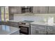 Modern kitchen with stainless steel appliances and gray cabinets at 1033 12Th Avenue Nw Dr, Hickory, NC 28601