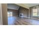 Spacious living area with hardwood floors, fireplace, and sliding doors at 1033 12Th Avenue Nw Dr, Hickory, NC 28601