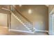 View of an elegant staircase with metal balusters at 1033 12Th Avenue Nw Dr, Hickory, NC 28601