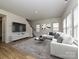 Spacious living room with large sectional sofa and flat-screen TV at 1412 Windy Park Dr, Stanley, NC 28164