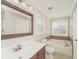 Bathroom with a garden tub, tile flooring and updated vanity at 19054 Long Pond Ln, Cornelius, NC 28031