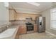 Kitchen features stainless steel appliances and light wood cabinets at 19054 Long Pond Ln, Cornelius, NC 28031