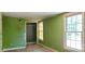 Simple bedroom with green walls, a closet, and a window at 3169 Eden Terrace Ext, Rock Hill, SC 29730